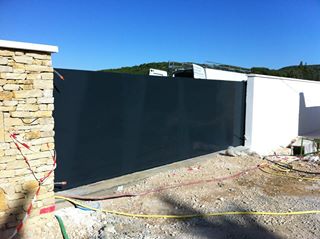 Portails coulissant fer forgé pleins finition thermolaquée à Martigues 13500